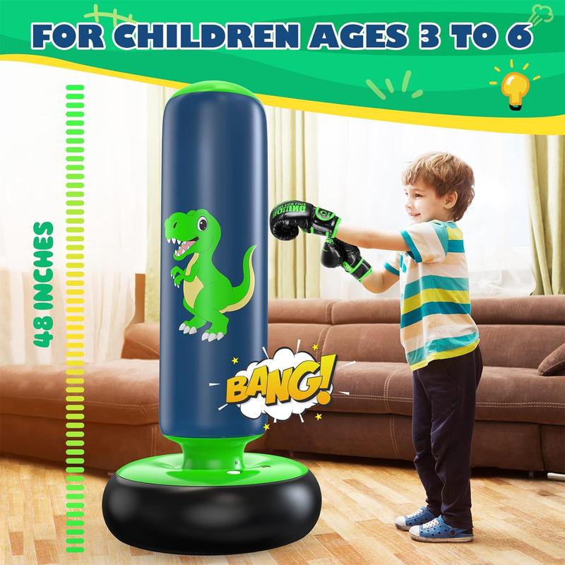 Children's inflatable punching bag with dinosaur design and child wearing boxing gloves indoors.