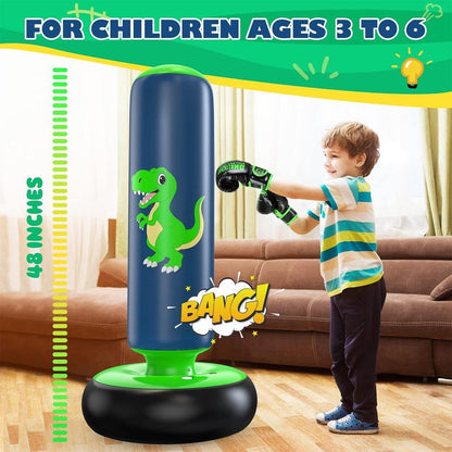 Children's inflatable punching bag with dinosaur design and child wearing boxing gloves indoors.